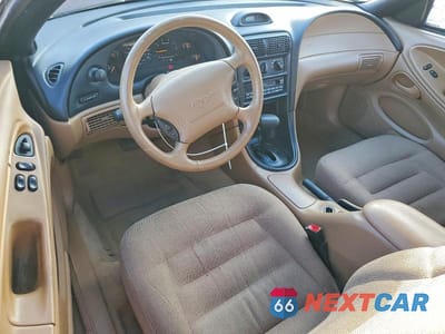 Zdjęcie 8 z 11 samochodu: 1997 FORD MUSTANG VIN:1FALP4046VF193591 - miniatura