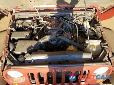 Zdjęcie 11 z 11 samochodu: 2007 JEEP WRANGLER SAHARA VIN:1J4GB59197L208334 - miniatura