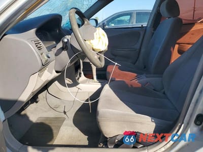 Zdjęcie 7 z 12 samochodu: 2001 TOYOTA COROLLA CE VIN:1NXBR12E11Z542629 - miniatura