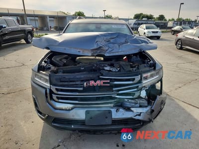 Piąte zdjęcie samochodu w środku: 2021 GMC ACADIA AT4 VIN:1GKKNLLS5MZ191865 - miniatura
