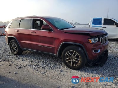 Czwarte zdjęcie samochodu z boku: 2019 JEEP GRAND CHEROKEE LAREDO VIN:1C4RJEAG5KC839432 - miniatura