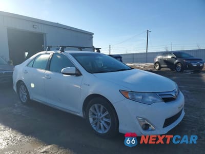 Czwarte zdjęcie samochodu z boku: 2014 TOYOTA CAMRY HYBRID VIN:4T1BD1FK7EU101737 - miniatura