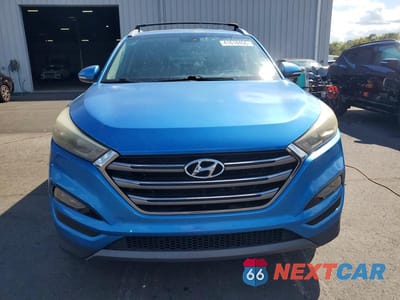 Piąte zdjęcie samochodu w środku: 2016 HYUNDAI TUCSON LIMITED VIN:KM8J33A22GU147416 - miniatura
