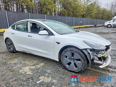 Czwarte zdjęcie samochodu z boku: 2021 TESLA MODEL 3 VIN:5YJ3E1EA3MF097501 - miniatura