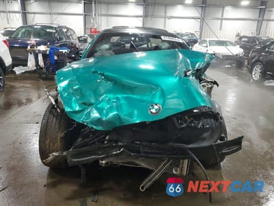 Piąte zdjęcie samochodu w środku: 2011 BMW 335 XI VIN:WBAKF9C50BE247315 - miniatura