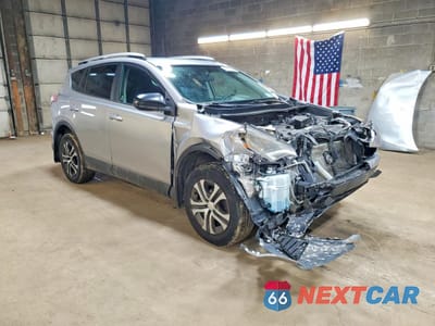 Czwarte zdjęcie samochodu z boku: 2016 TOYOTA RAV4 LE VIN:2T3BFREVXGW518638 - miniatura