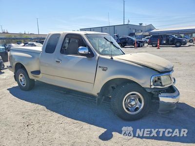 Czwarte zdjęcie samochodu z boku: 1999 FORD F150 VIN:1FTRX07W0XKC23523 - miniatura