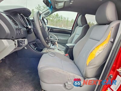 Zdjęcie 7 z 13 samochodu: 2014 TOYOTA TACOMA V6 VIN:3TMLU4EN6EM146209 - miniatura