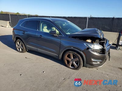 Czwarte zdjęcie samochodu z boku: 2017 LINCOLN MKC PREMIERE VIN:5LMCJ1C97HUL45663 - miniatura