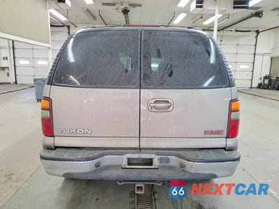 Zdjęcie 6 z 14 samochodu: 2002 GMC YUKON VIN:1GKEK13VX2R117374 - miniatura