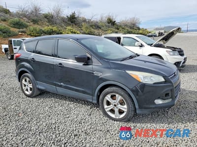 Czwarte zdjęcie samochodu z boku: 2014 FORD ESCAPE SE VIN:1FMCU0GX8EUE23487 - miniatura