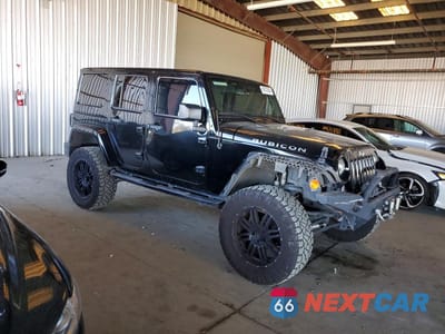 Czwarte zdjęcie samochodu z boku: 2017 JEEP WRANGLER UNLIMITED RUBICON VIN:1C4BJWFG2HL610490 - miniatura