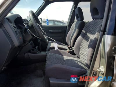 Zdjęcie 7 z 12 samochodu: 2000 TOYOTA RAV4 BASE VIN:JT3HP10V8Y7152406 - miniatura