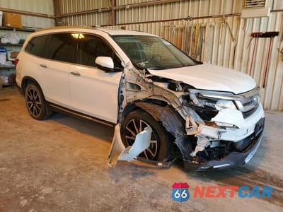 Czwarte zdjęcie samochodu z boku: 2021 HONDA PILOT TOURING VIN:5FNYF5H91MB014174 - miniatura