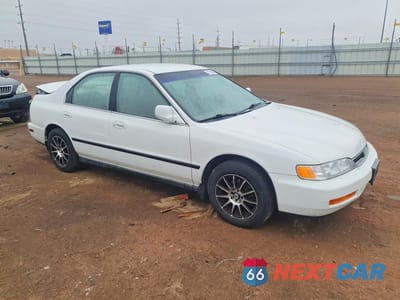 Czwarte zdjęcie samochodu z boku: 1997 HONDA ACCORD LX VIN:1HGCD5632VA052183 - miniatura