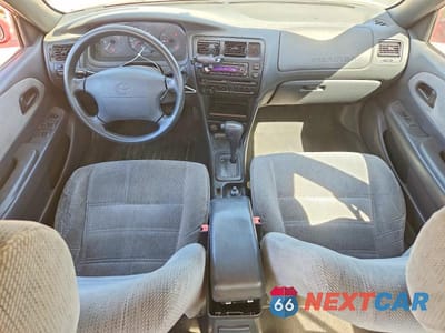 Zdjęcie 8 z 11 samochodu: 1997 TOYOTA COROLLA DX VIN:1NXBB02E5VZ608619 - miniatura