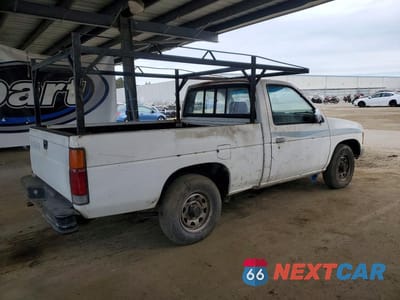 Trzecie zdjęcie samochodu z tyłu: 1989 NISSAN TRUCK BASE VIN:1N6ND11S9KC364903 - miniatura