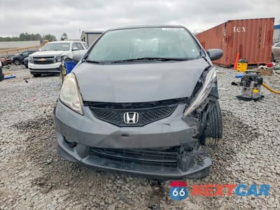 Piąte zdjęcie samochodu w środku: 2011 HONDA FIT SPORT VIN:JHMGE8H63BS007764 - miniatura