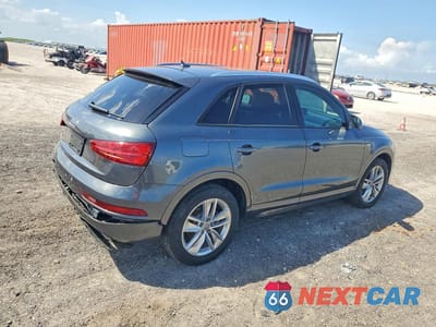 Trzecie zdjęcie samochodu z tyłu: 2018 AUDI Q3 PREMIUM VIN:WA1BCCFS4JR010998 - miniatura