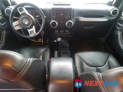 Zdjęcie 8 z 12 samochodu: 2014 JEEP WRANGLER UNLIMITED VIN:1C4HJWFG5EL263226 - miniatura