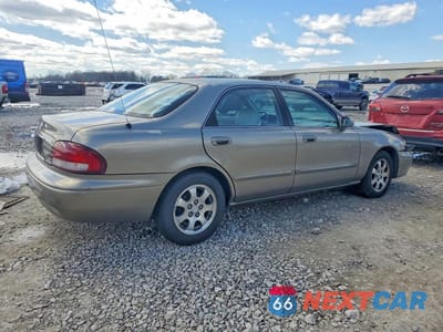 Trzecie zdjęcie samochodu z tyłu: 1998 MAZDA 626 DX VIN:1YVGF22C8W5773403 - miniatura