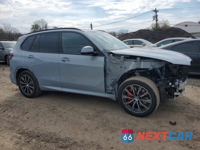 Czwarte zdjęcie samochodu z boku: 2026 BMW X5 XDRIVE40I VIN:5UX23EU06T9289293 - miniatura