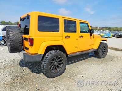 Trzecie zdjęcie samochodu z tyłu: 2012 JEEP WRANGLER UNLIMITED SAHARA VIN:1C4BJWEGXCL133897 - miniatura