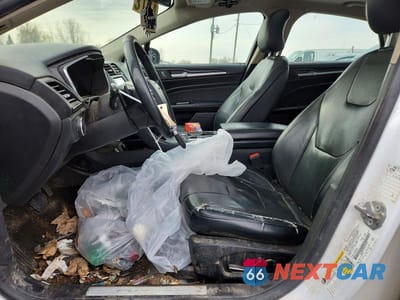 Zdjęcie 7 z 12 samochodu: 2019 FORD FUSION TITANIUM VIN:3FA6P0D93KR242918 - miniatura