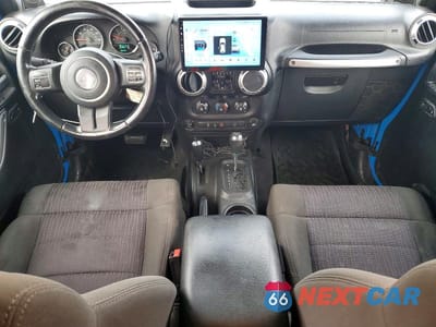Zdjęcie 8 z 13 samochodu: 2011 JEEP WRANGLER UNLIMITED SAHARA VIN:1J4BA5H1XBL548650 - miniatura