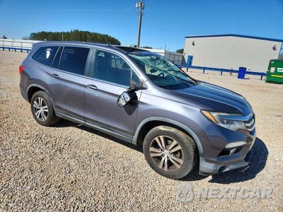 Czwarte zdjęcie samochodu z boku: 2016 HONDA PILOT EXL VIN:5FNYF6H54GB105933 - miniatura