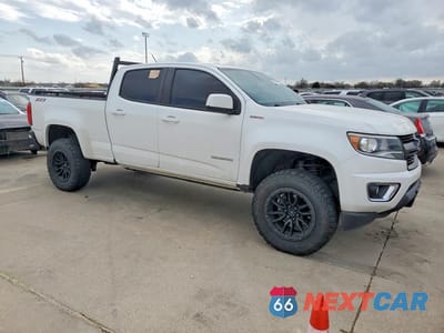 Czwarte zdjęcie samochodu z boku: 2018 CHEVROLET COLORADO Z71 VIN:1GCPTDE1XJ1157366 - miniatura