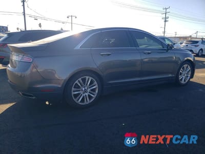 Trzecie zdjęcie samochodu z tyłu: 2015 LINCOLN MKZ HYBRID VIN:3LN6L2LU5FR603140 - miniatura