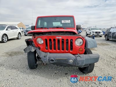 Piąte zdjęcie samochodu w środku: 2011 JEEP WRANGLER UNLIMITED SPORT VIN:1J4BA3H19BL567582 - miniatura