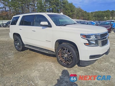 Czwarte zdjęcie samochodu z boku: 2015 CHEVROLET TAHOE C1500 LT VIN:1GNSCBKC1FR548748 - miniatura