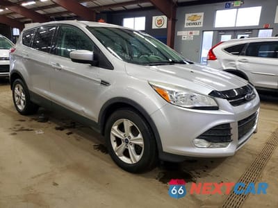 Czwarte zdjęcie samochodu z boku: 2016 FORD ESCAPE SE VIN:1FMCU9GX1GUB85022 - miniatura