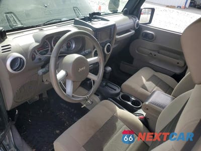 Zdjęcie 8 z 12 samochodu: 2010 JEEP WRANGLER SAHARA VIN:1J4AA5D19AL123176 - miniatura