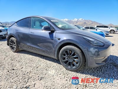 Czwarte zdjęcie samochodu z boku: 2023 TESLA MODEL Y VIN:7SAYGDEE2PF597970 - miniatura