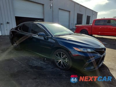 Czwarte zdjęcie samochodu z boku: 2024 TOYOTA CAMRY SE VIN:4T1T11AK1RU904862 - miniatura