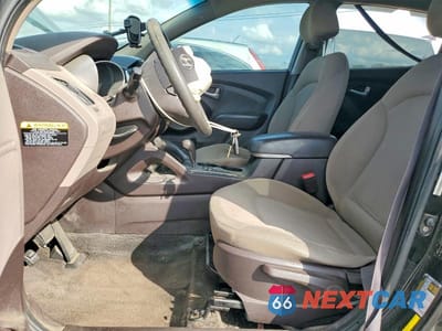 Zdjęcie 7 z 13 samochodu: 2013 HYUNDAI TUCSON GL VIN:KM8JT3AB6DU588879 - miniatura