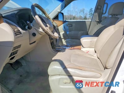 Zdjęcie 7 z 13 samochodu: 2014 INFINITI QX80 BASE VIN:JN8AZ2NE7E9067955 - miniatura