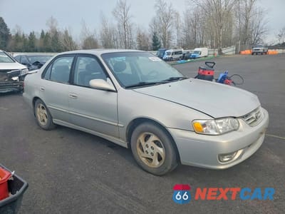 Czwarte zdjęcie samochodu z boku: 2001 TOYOTA COROLLA VIN:1NXBR12E01Z435006 - miniatura