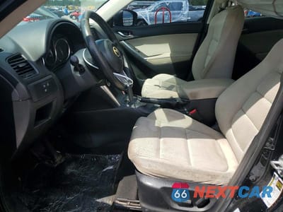 Zdjęcie 7 z 13 samochodu: 2014 MAZDA CX-5 TOURING VIN:JM3KE2CY4E0335591 - miniatura