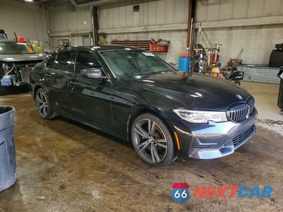 Czwarte zdjęcie samochodu z boku: 2019 BMW 330XI VIN:3MW5R7J50K8B02080 - miniatura