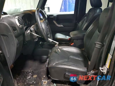 Zdjęcie 7 z 12 samochodu: 2016 JEEP WRANGLER UNLIMITED SAHARA VIN:1C4BJWEG2GL252095 - miniatura