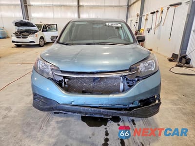 Piąte zdjęcie samochodu w środku: 2014 HONDA CR-V LX VIN:2HKRM4H39EH711739 - miniatura