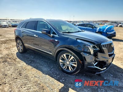 Czwarte zdjęcie samochodu z boku: 2021 CADILLAC XT5 PREMIUM LUXURY VIN:1GYKNDRS9MZ137519 - miniatura
