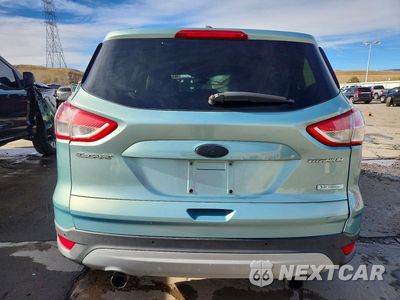 Zdjęcie 6 z 13 samochodu: 2013 FORD ESCAPE TITANIUM VIN:1FMCU0J94DUC13607 - miniatura