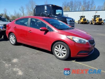 Czwarte zdjęcie samochodu z boku: 2014 KIA FORTE LX VIN:KNAFX4A6XE5218857 - miniatura