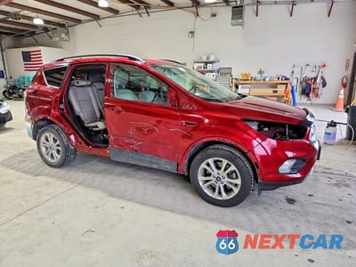 Czwarte zdjęcie samochodu z boku: 2018 FORD ESCAPE SEL VIN:1FMCU9HD3JUD15524 - miniatura