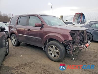 Czwarte zdjęcie samochodu z boku: 2010 HONDA PILOT TOURING VIN:5FNYF4H80AB026510 - miniatura